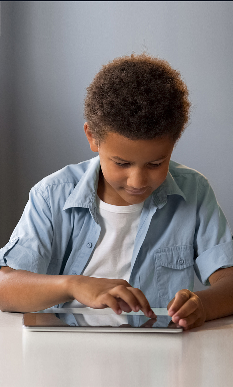 Little,Clever,Kid,Swiping,Tablet,Playing,In,Interactive,Educational,Application